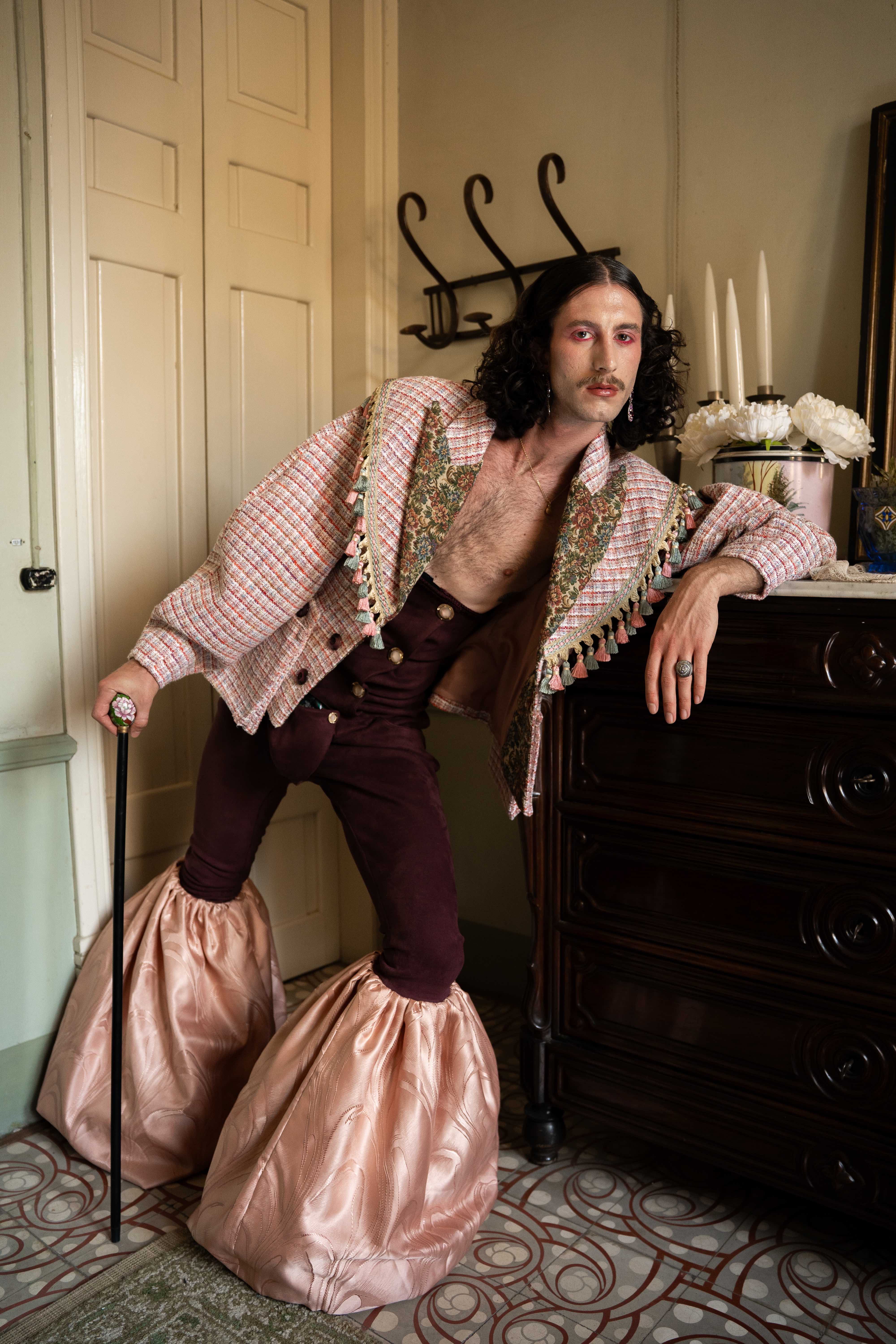Mona Puppet Riot FW25 — upholstery tweed jacket with burgundy trousers, Mariona Ramos fashion design