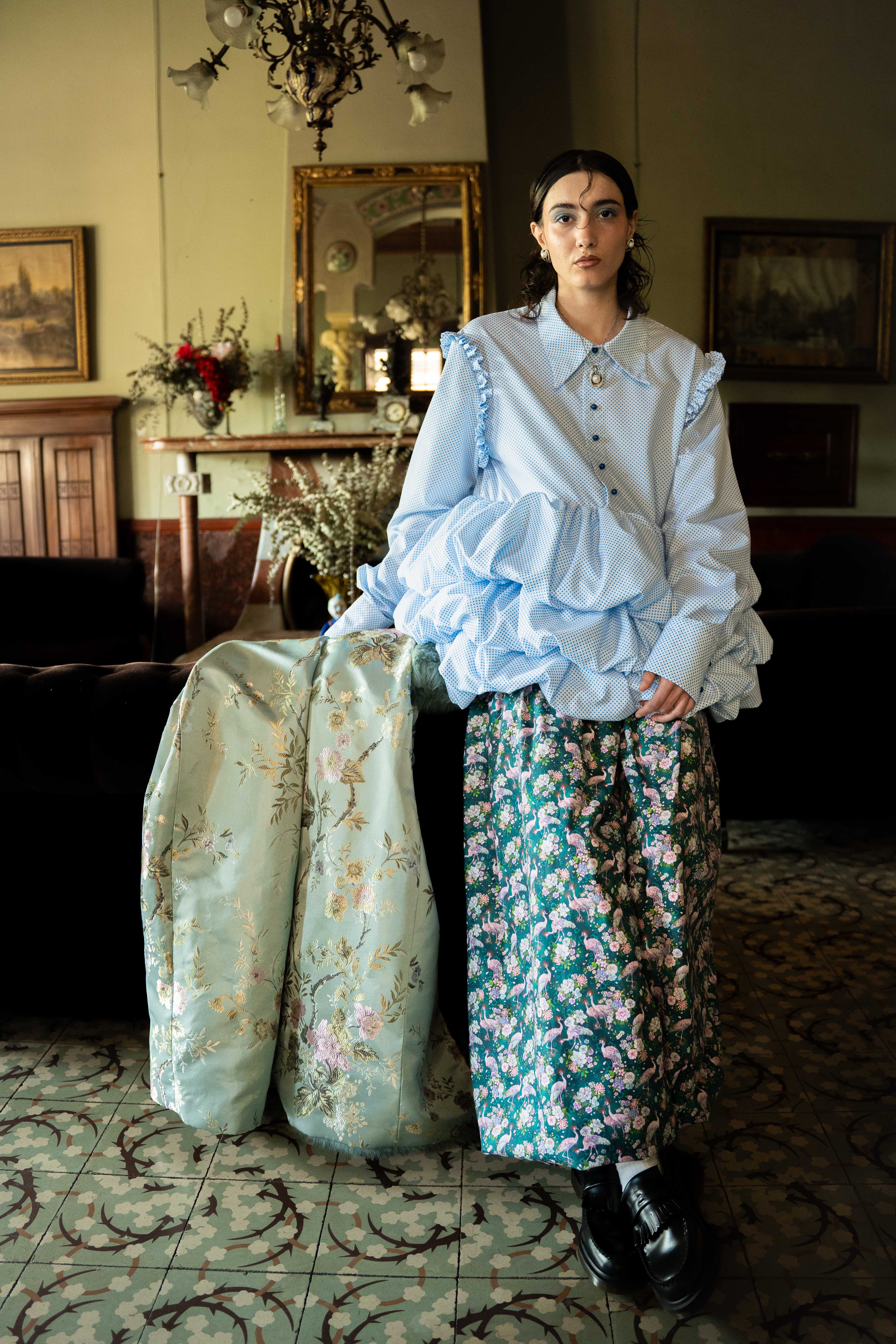 Mona Puppet Riot FW25 — puffy sleeve blouse with floral brocade skirt, pattern maker Barcelona